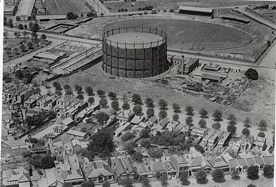 A view of the Arden street oval in 1928 (including the famous gasometer)